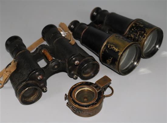 A Military pocket compass T.G. Co Ltd I.S. 40 MK III, in leather case and two pairs of binoculars